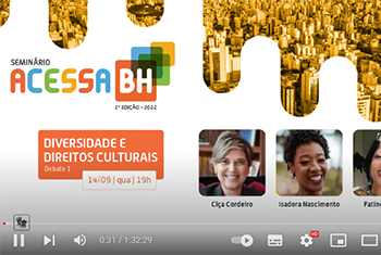 Print de vídeo do youtube, fundo branco com título colorido: “Seminário Acessa BH, segunda edição 2022, Diversidade e direitos culturais”. A direita do texto imagem ondulada em tons de amarelo de BH vista de cima com vários prédios, abaixo fotos de três mulheres, entre elas Isadora.